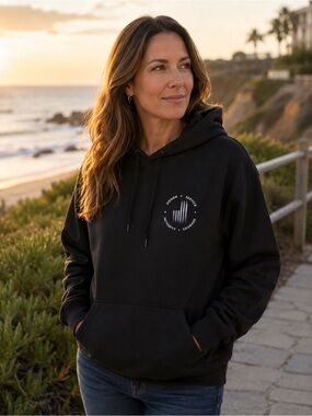 Blue line flag on black hoodie with “honor, service, integrity, courage”